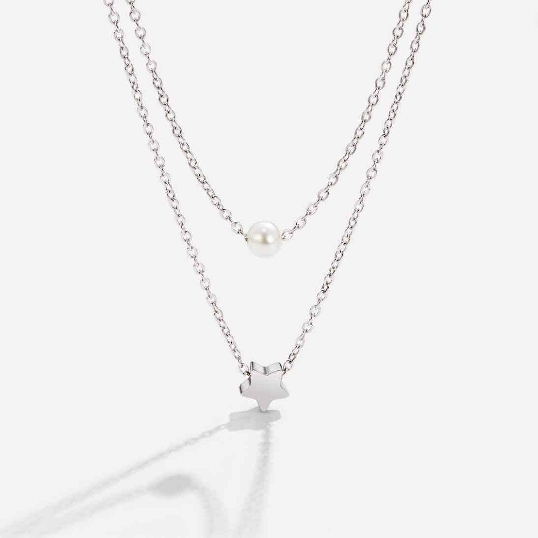 Collier étoile et perle en argent